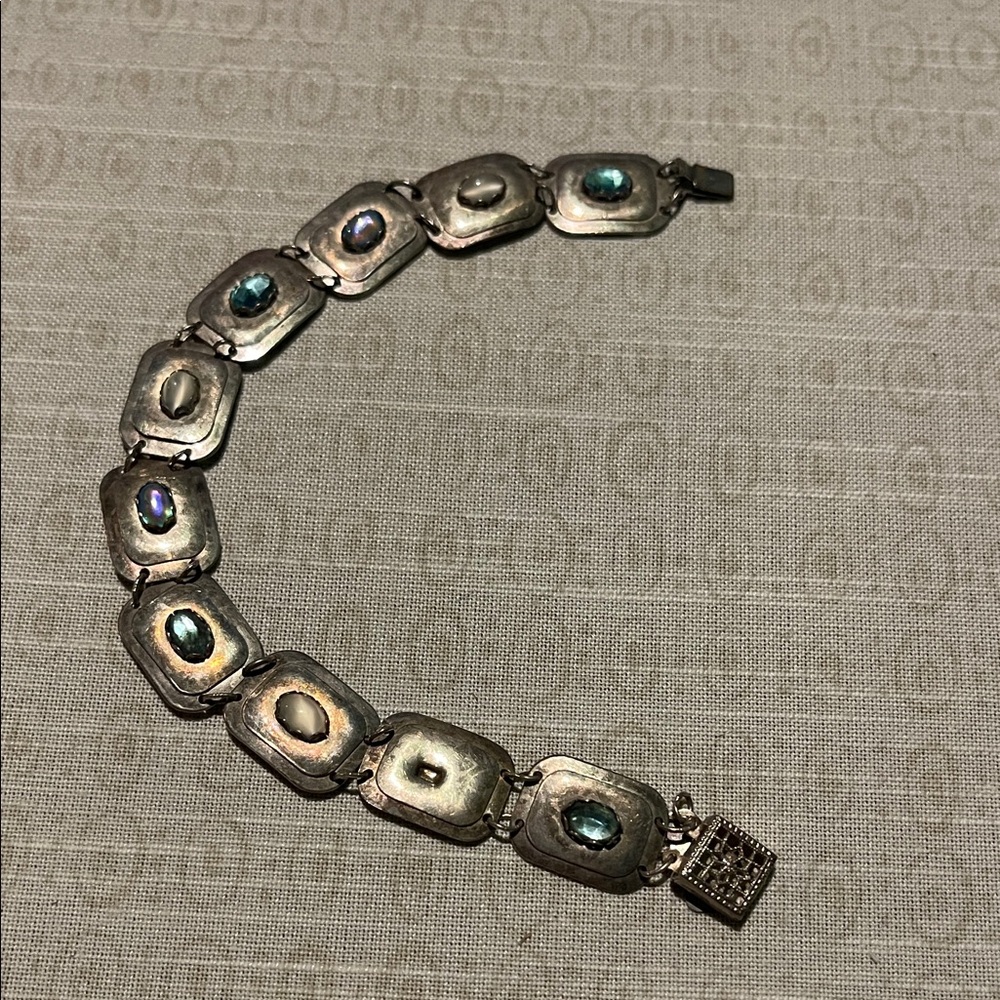 Holly Yashi Sterling Silver and gemstone bracelet with. Missing one stone!